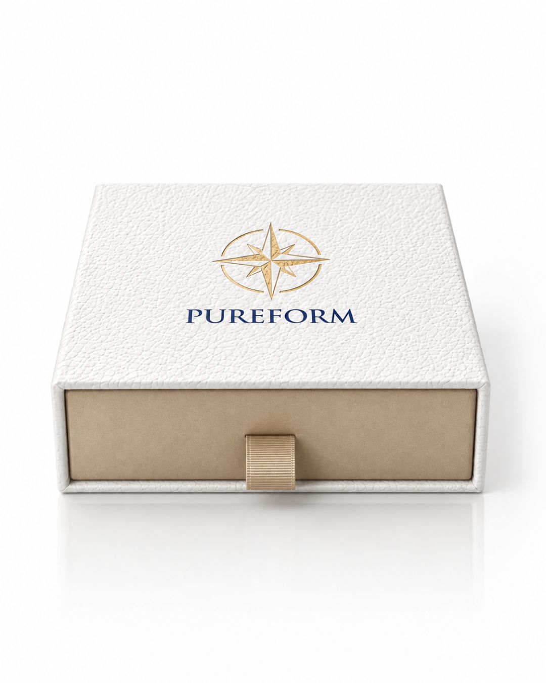 Front view of the Pureform ivory gift box with champagne drawer and ribbon pull