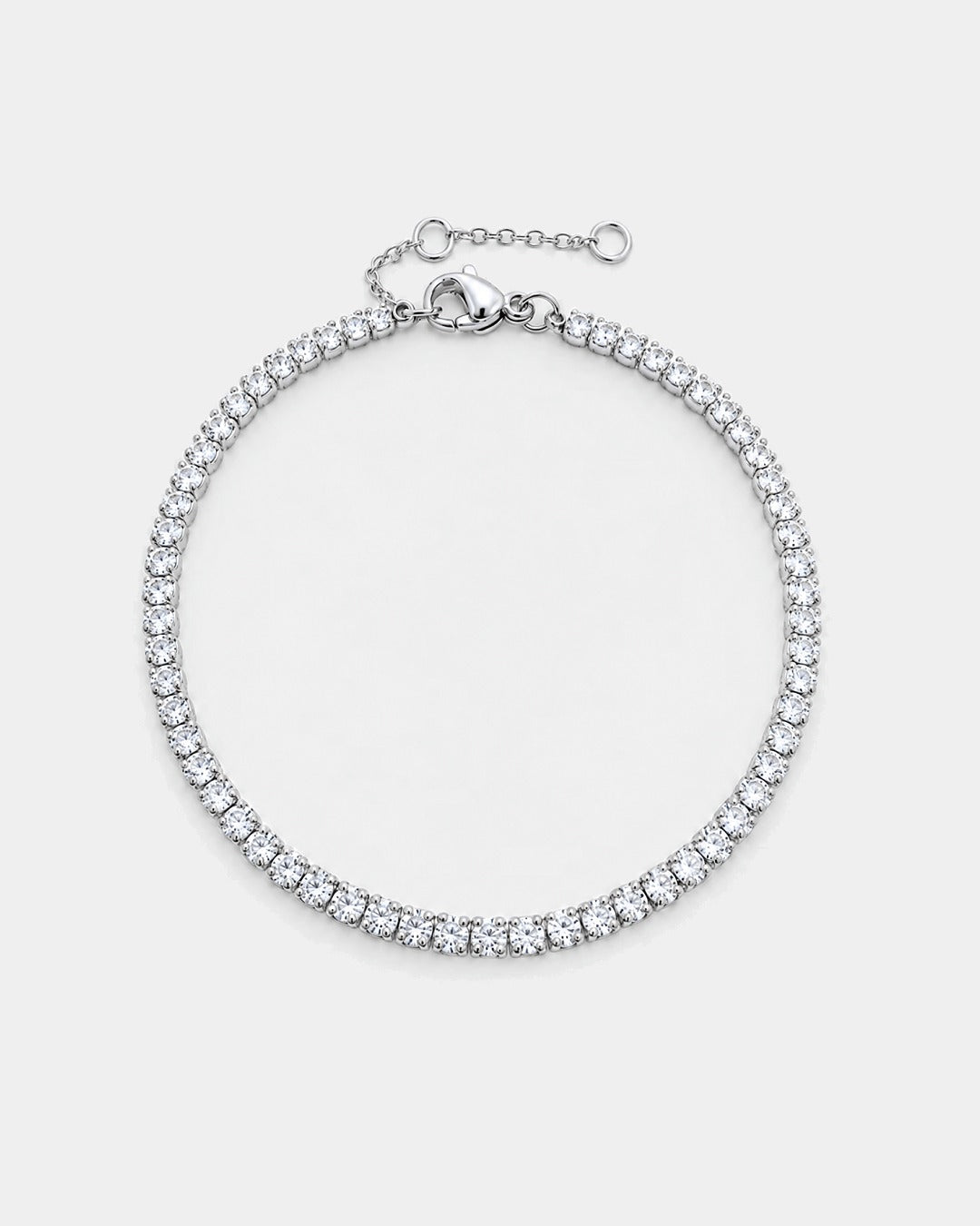 Pureform Fine Tennis Bracelet in silver with clear round-cut stones, top view