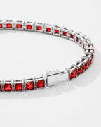 Polished silver-tone steel bracelet with ruby red stones, clean unisex design by Pureform