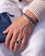 18K gold plated steel bracelet with sapphire blue stones, clean unisex design by Pureform
