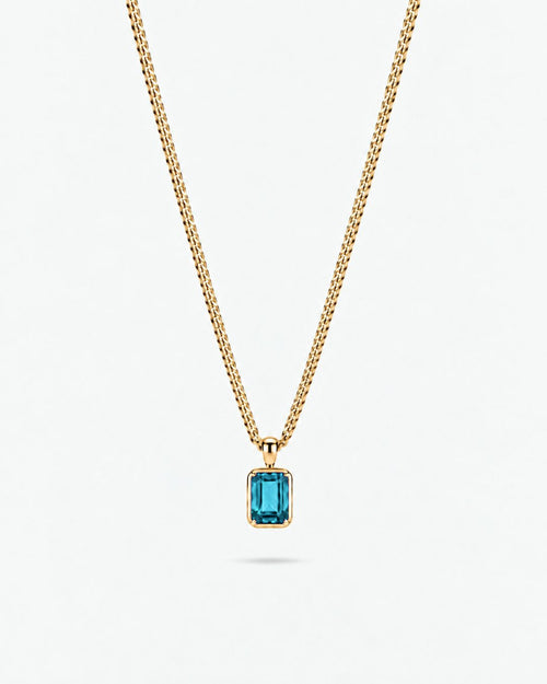 Aquamarine pendant necklace, 1 carat, 18K gold — studio packshot on white