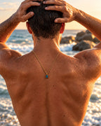 Aquamarine pendant necklace, 1 carat, 18K gold — worn, seen from behind