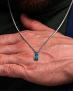 Aquamarine pendant necklace, 2 carat, 925 silver — shown in hand for scale