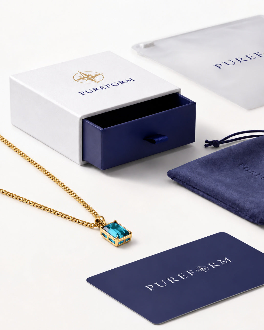 Aquamarine pendant necklace, 3 carat, 18K gold — shown with Pureform packaging