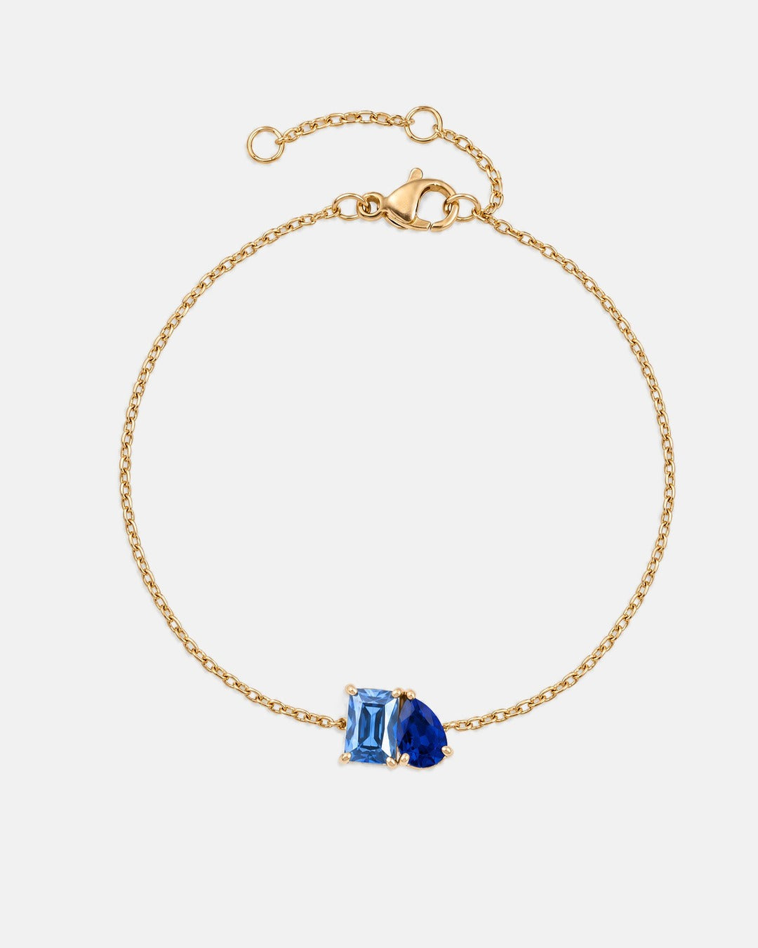March birthstone bracelet in 14K gold, light sapphire blue and sapphire blue stones