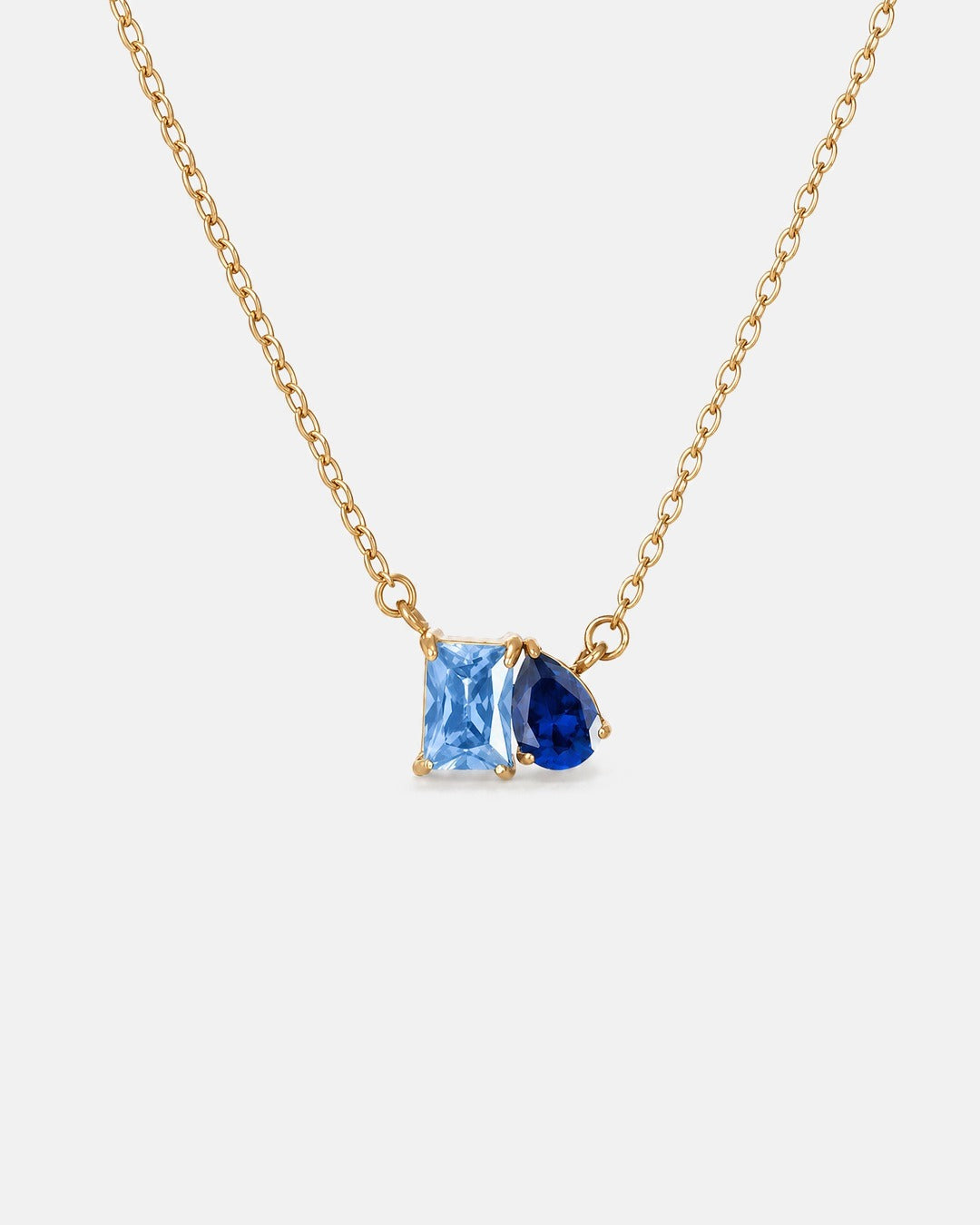 March birthstone necklace in 14K gold, light sapphire blue and sapphire blue stones