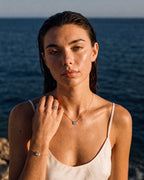 Model wearing the December birthstone set in 14K gold