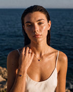 Model wearing the February birthstone set in 14K gold