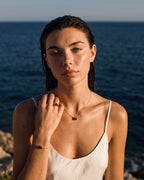 Model wearing the January birthstone set in 14K gold