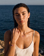 Model wearing the October birthstone set in 14K gold
