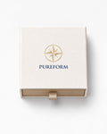 Pureform ivory gift box seen from above with gold foil compass emblem