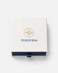 Pureform gift box seen from above with gold foil compass emblem