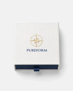 Pureform gift box seen from above with gold foil compass emblem