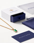 Emerald pendant necklace, 2 carat, 18K gold — shown with Pureform packaging