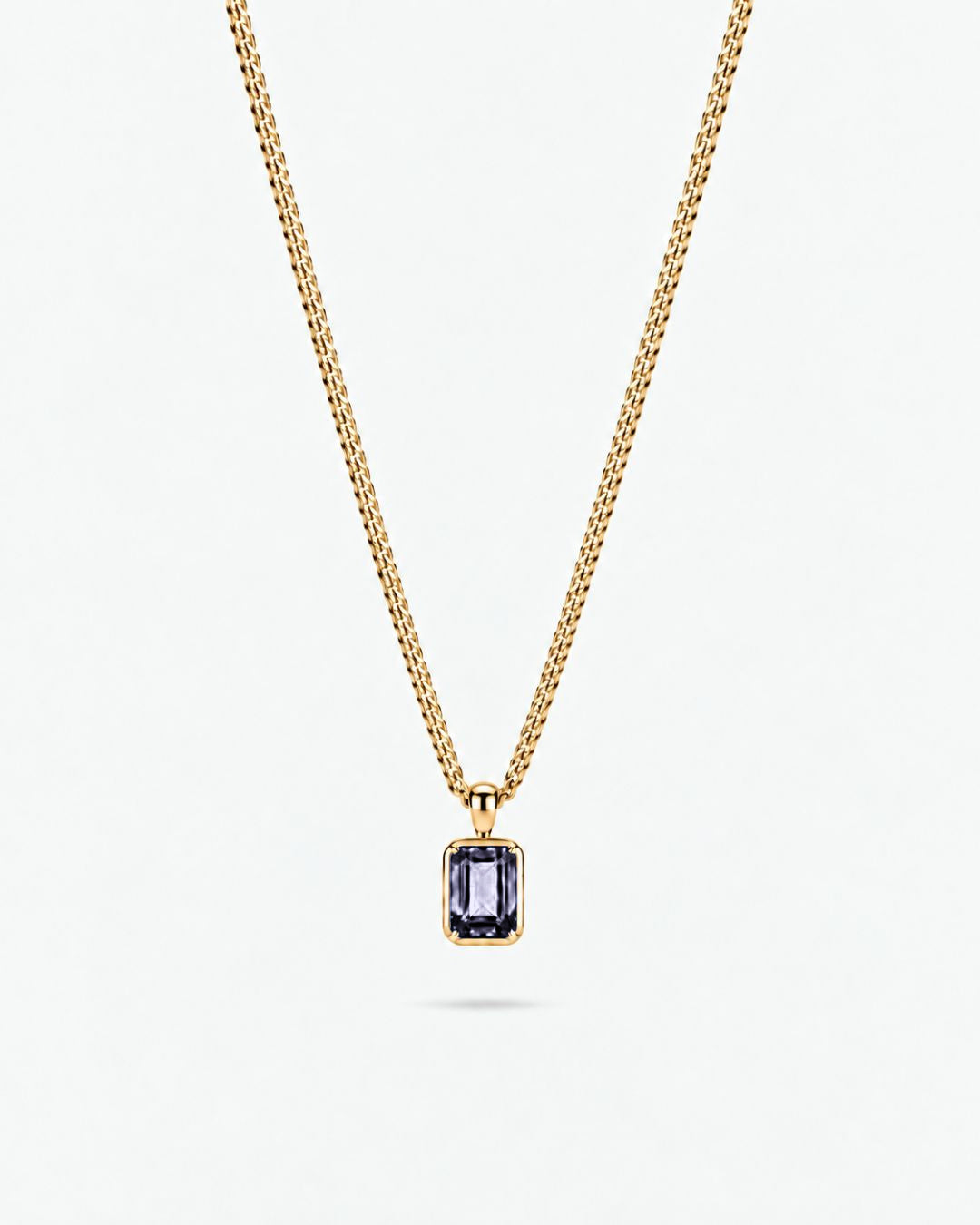 Grey Spinel pendant necklace, 1 carat, 18K gold — studio packshot on white
