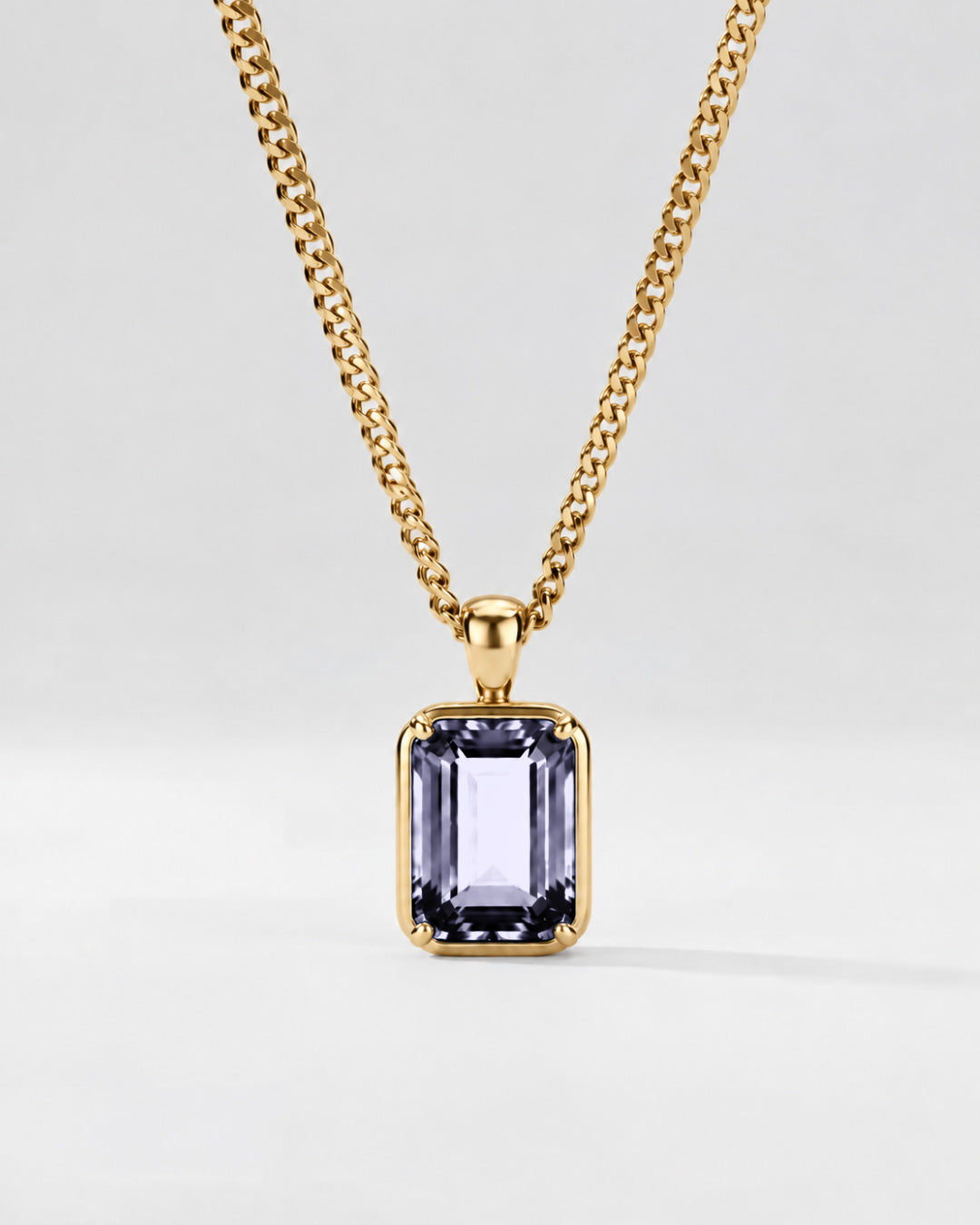 Grey Spinel pendant necklace, 3 carat, 18K gold — close studio packshot