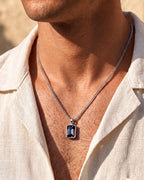 Grey Spinel pendant necklace, 3 carat, 925 silver — worn with an open linen shirt