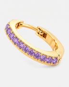 Close-up of the amethyst stones on the gold Lumière huggie earring