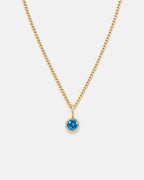 Lumière birthstone necklace in blue topaz gold