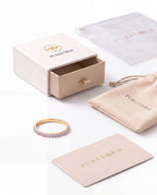 Lumière ring in alexandrite gold with Pureform jewelry packaging
