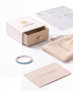 Lumière ring in sea blue silver with Pureform jewelry packaging