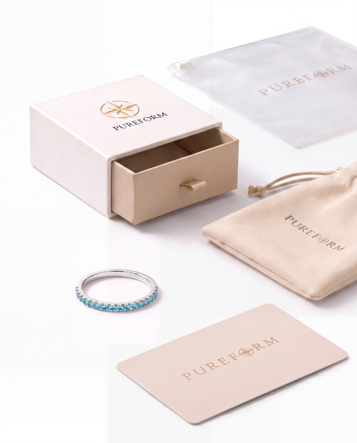 Lumière ring in sea blue silver with Pureform jewelry packaging