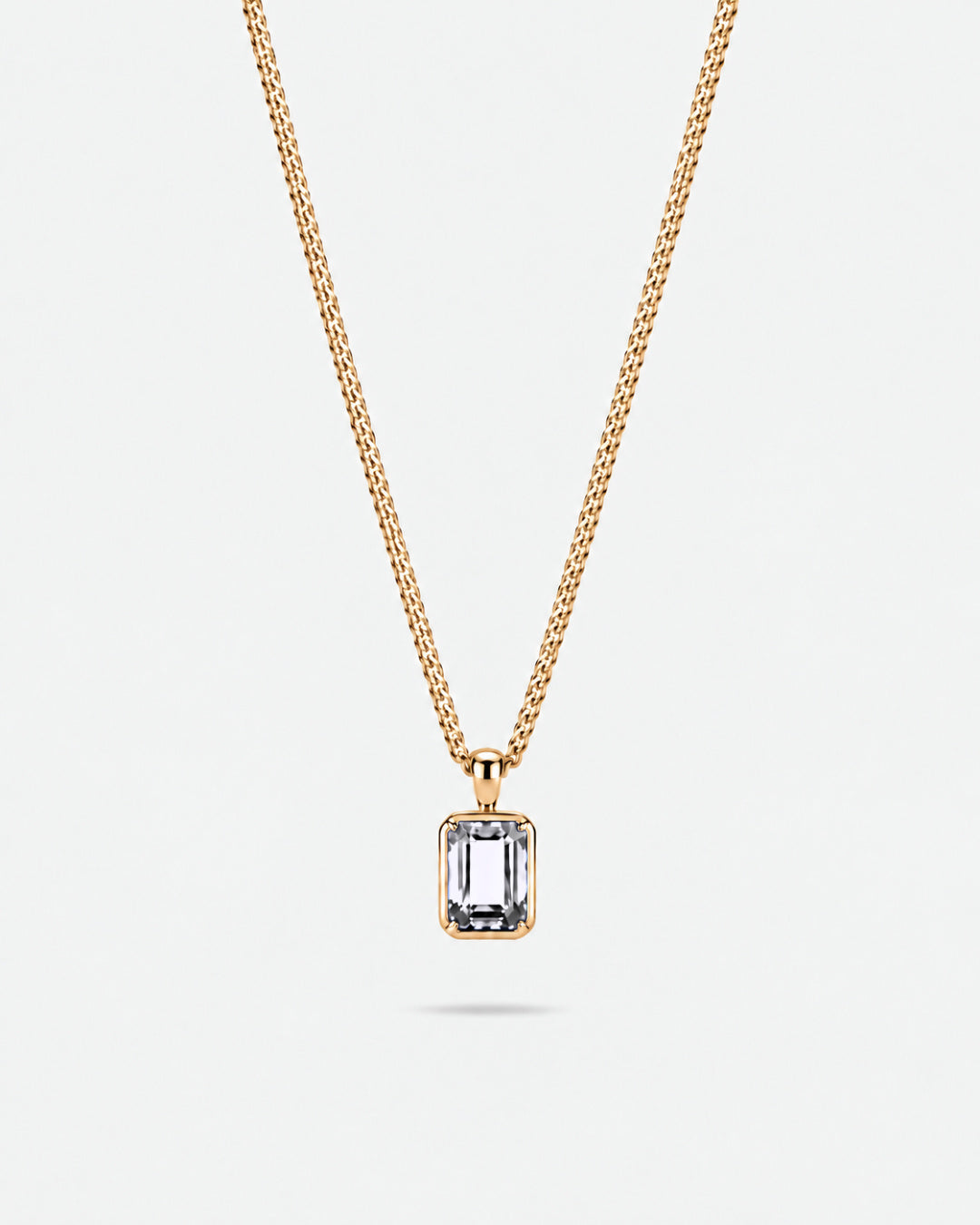 Moissanite pendant necklace, 2 carat, 18K gold — studio packshot on white
