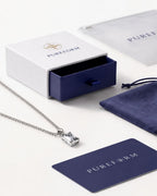 Moissanite pendant necklace, 2 carat, 925 silver — shown with Pureform packaging