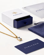Moissanite pendant necklace, 3 carat, 18K gold — shown with Pureform packaging