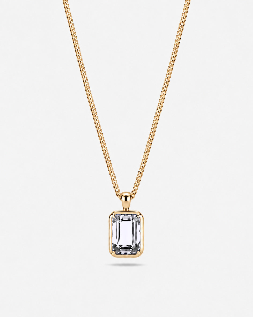 Moissanite pendant necklace, 3 carat, 18K gold — studio packshot on white