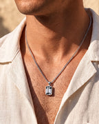 Moissanite pendant necklace, 3 carat, 925 silver — worn with an open linen shirt