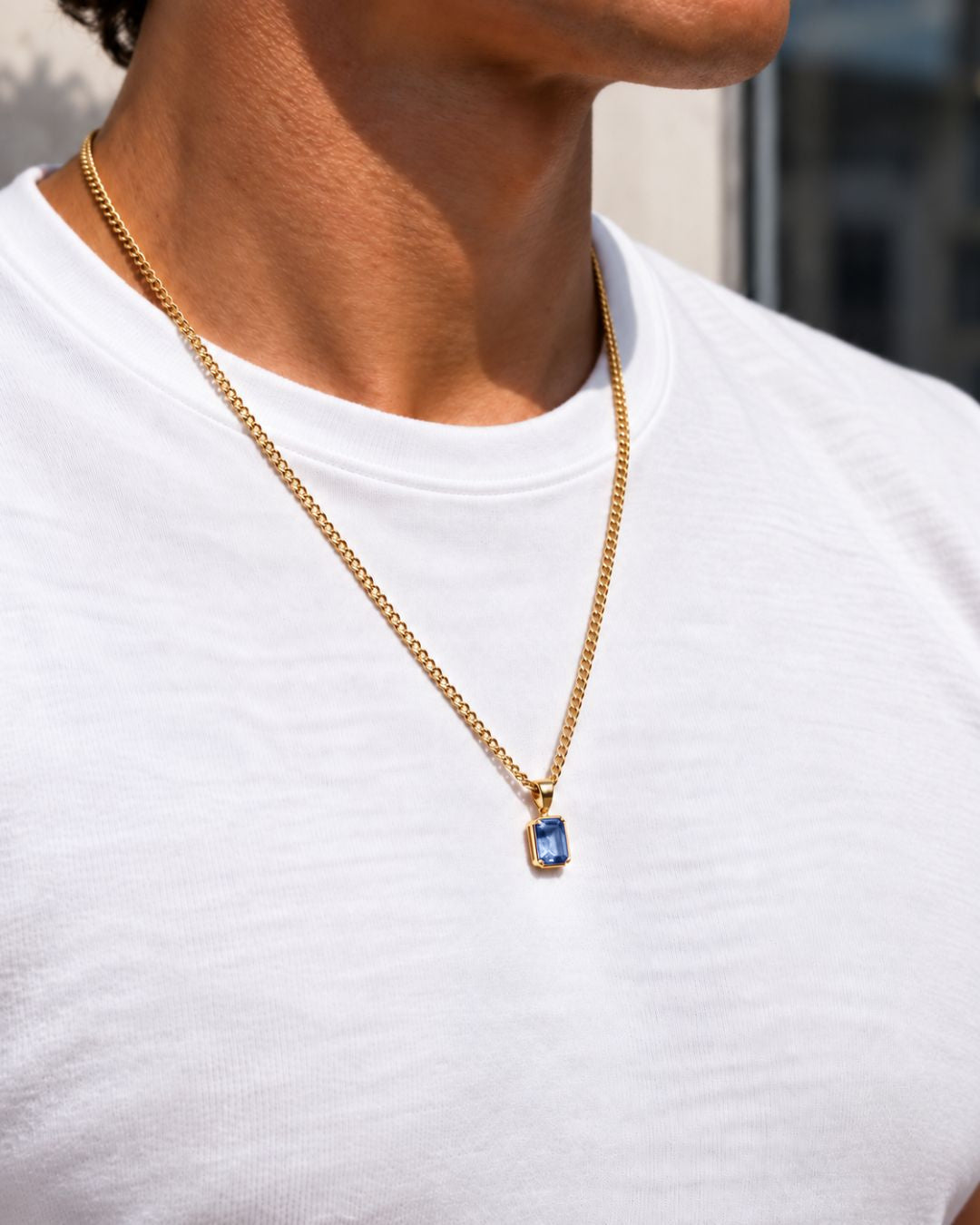 Royal Blue pendant necklace, 1 carat, 18K gold — worn with a white tee