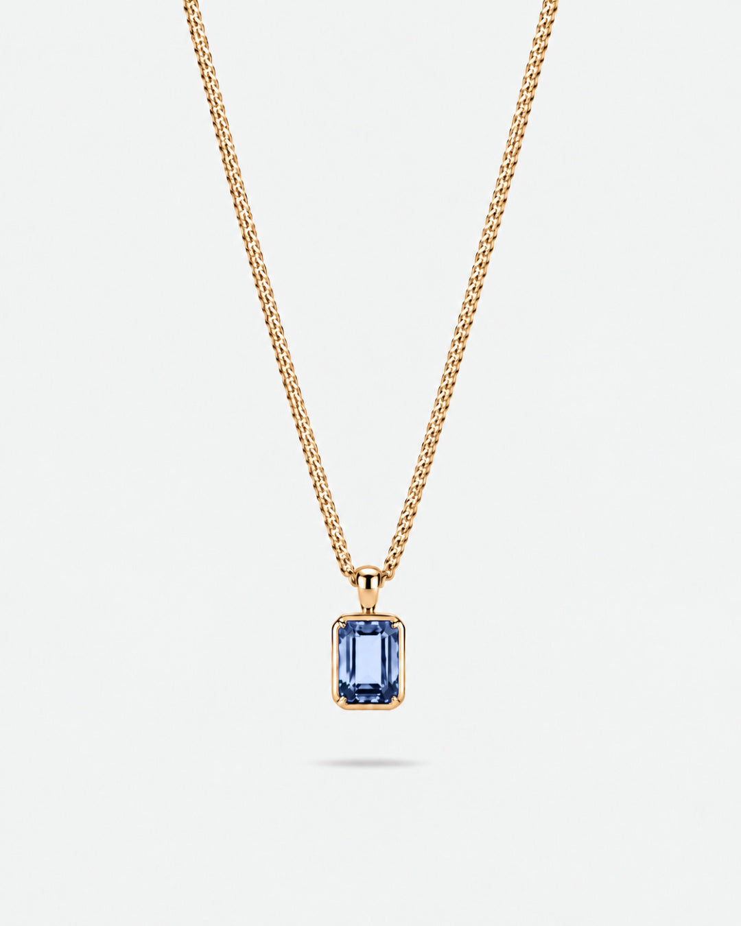 Royal Blue pendant necklace, 2 carat, 18K gold — studio packshot on white