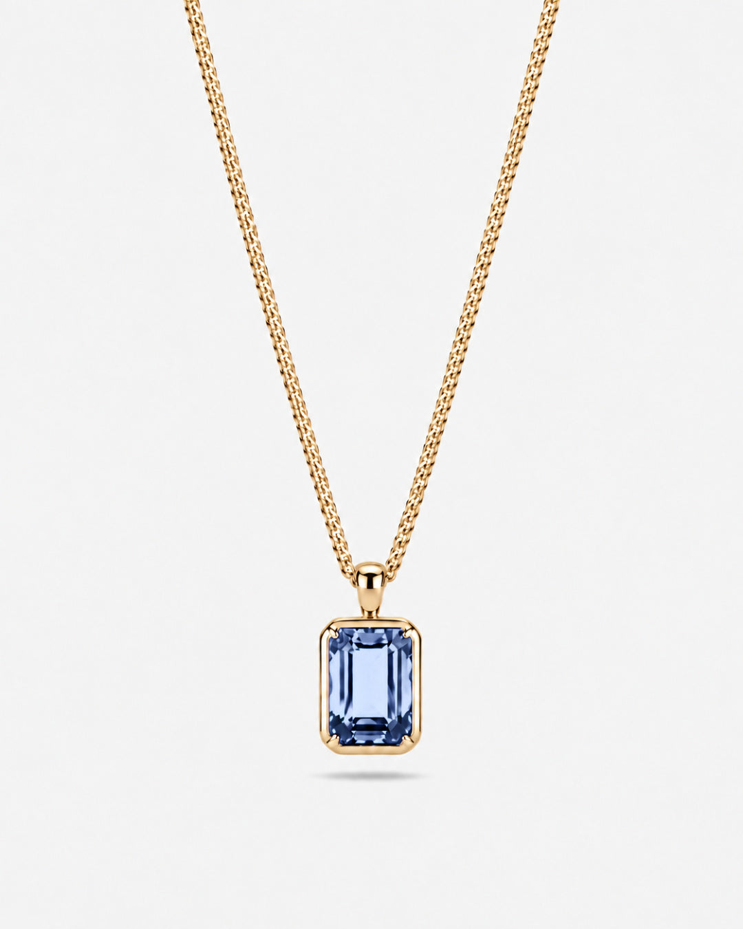 Royal Blue pendant necklace, 3 carat, 18K gold — studio packshot on white