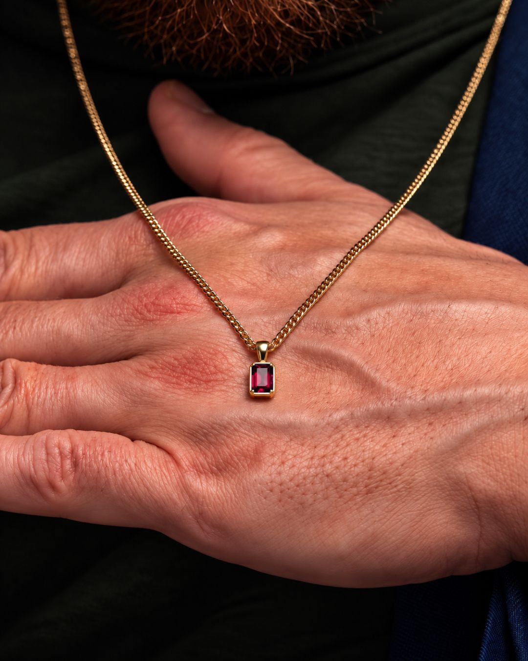 Ruby pendant necklace, 1 carat, 18K gold — shown in hand for scale