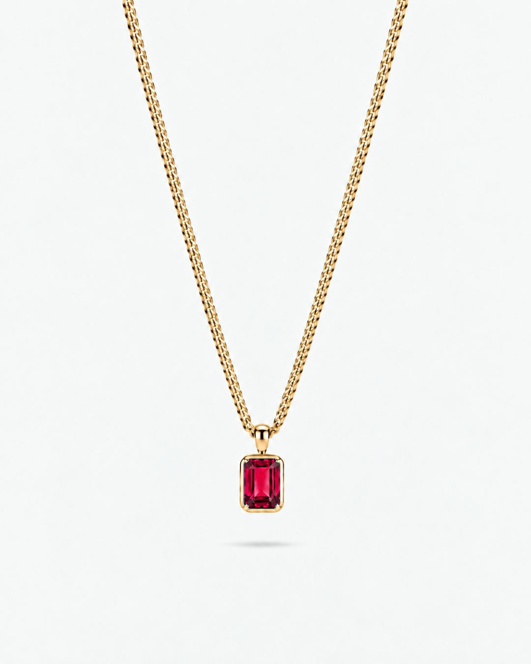 Ruby pendant necklace, 1 carat, 18K gold — studio packshot on white