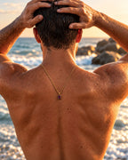 Ruby pendant necklace, 1 carat, 18K gold — worn, seen from behind