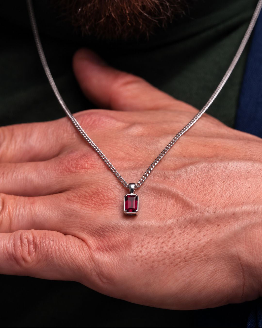 Ruby pendant necklace, 2 carat, 925 silver — shown in hand for scale