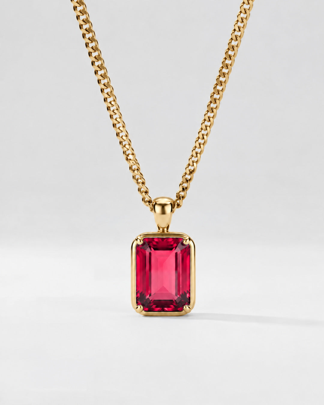 Ruby pendant necklace, 3 carat, 18K gold — close studio packshot