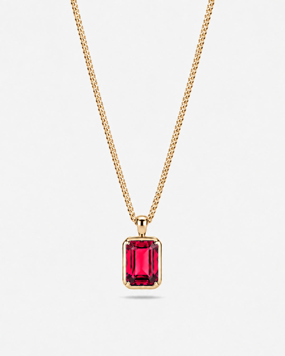 Ruby pendant necklace, 3 carat, 18K gold — studio packshot on white