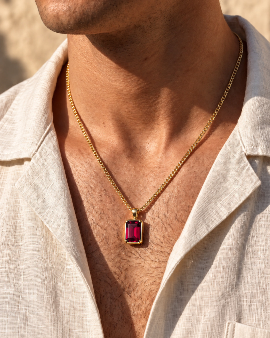 Ruby pendant necklace, 3 carat, 18K gold — worn with an open linen shirt
