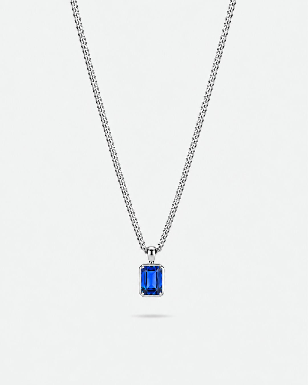 Sapphire pendant necklace, 1 carat, 925 silver — studio packshot on white