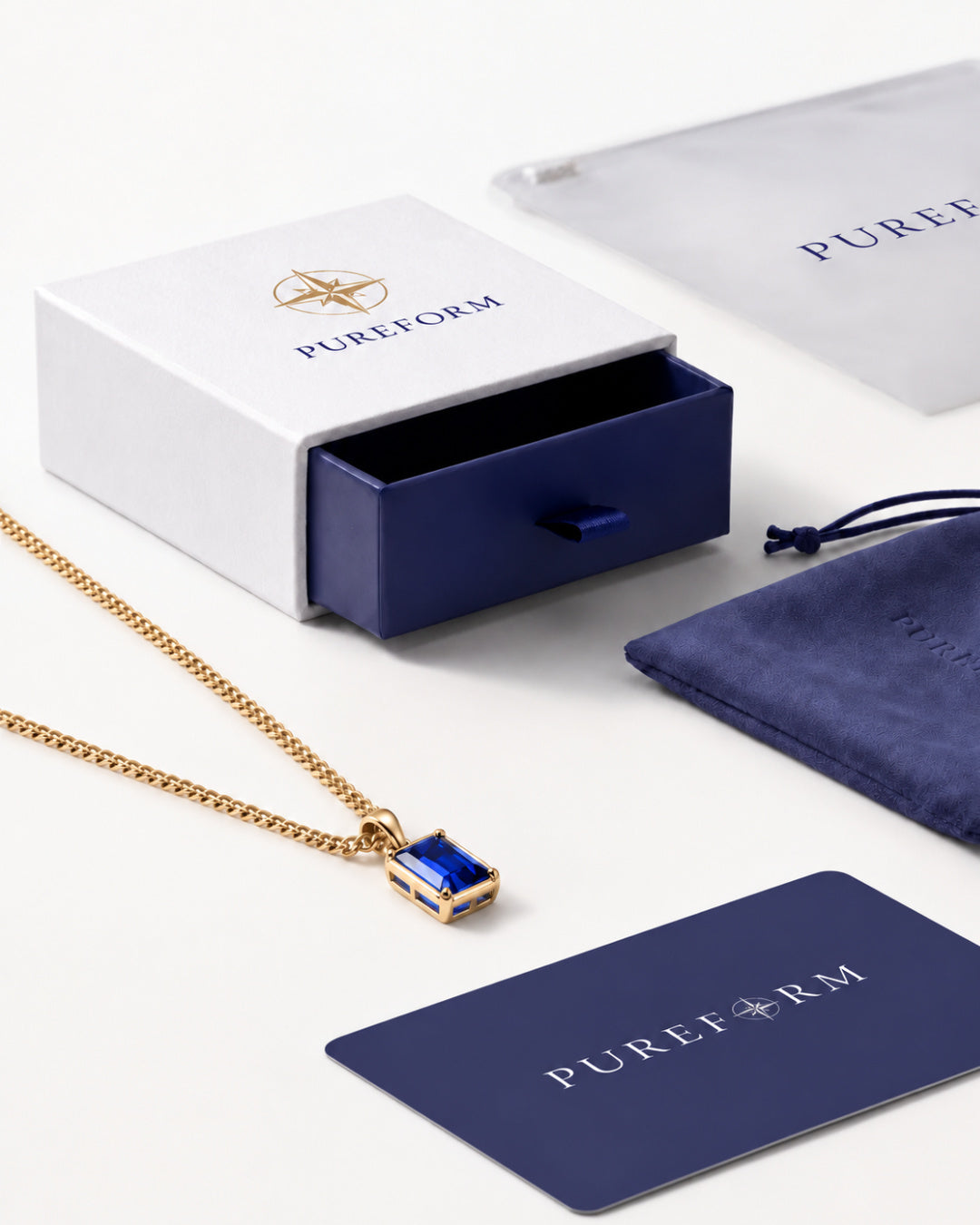 Sapphire pendant necklace, 2 carat, 18K gold — shown with Pureform packaging