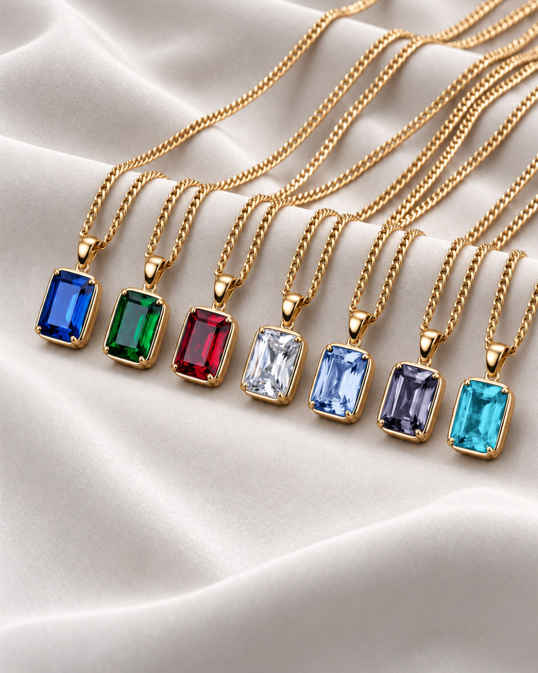 Sapphire pendant necklace, 3 carat, 18K gold — the full colour range
