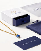 Sapphire pendant necklace, 3 carat, 18K gold — shown with Pureform packaging