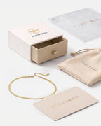 Serpent Flat Necklace in 18K gold with extender, Pureform gift box, pouch and card